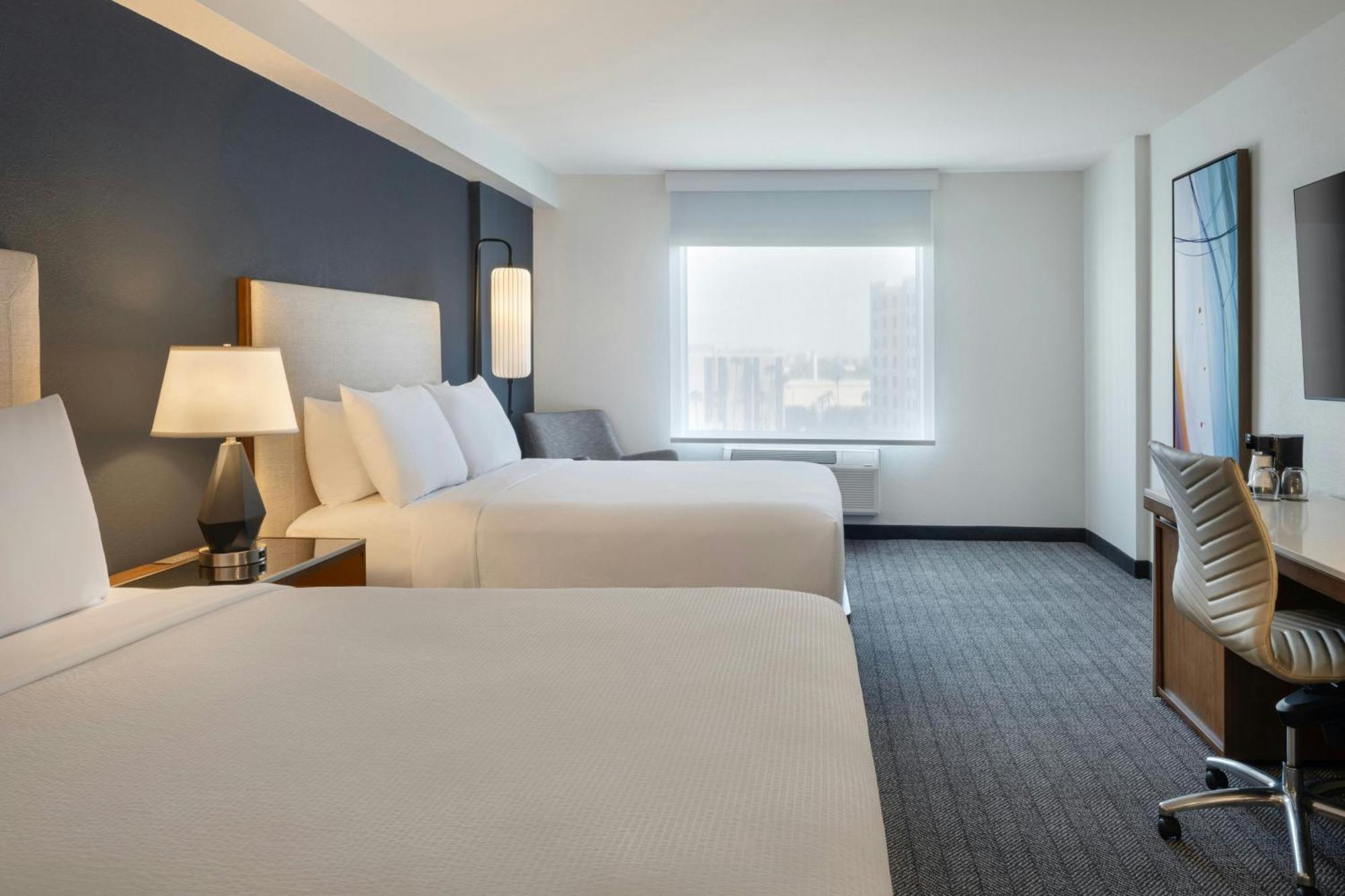 Queen Room Two Queen Beds Roll Shower City View Mobility Hearing Accessible
