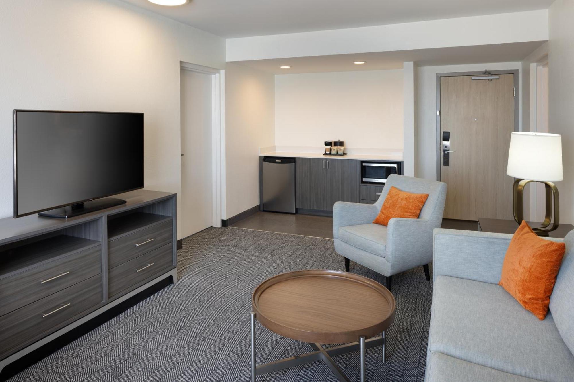 One-Bedroom King Suite Sofa Bed Roll Shower Mobility Hearing Accessible