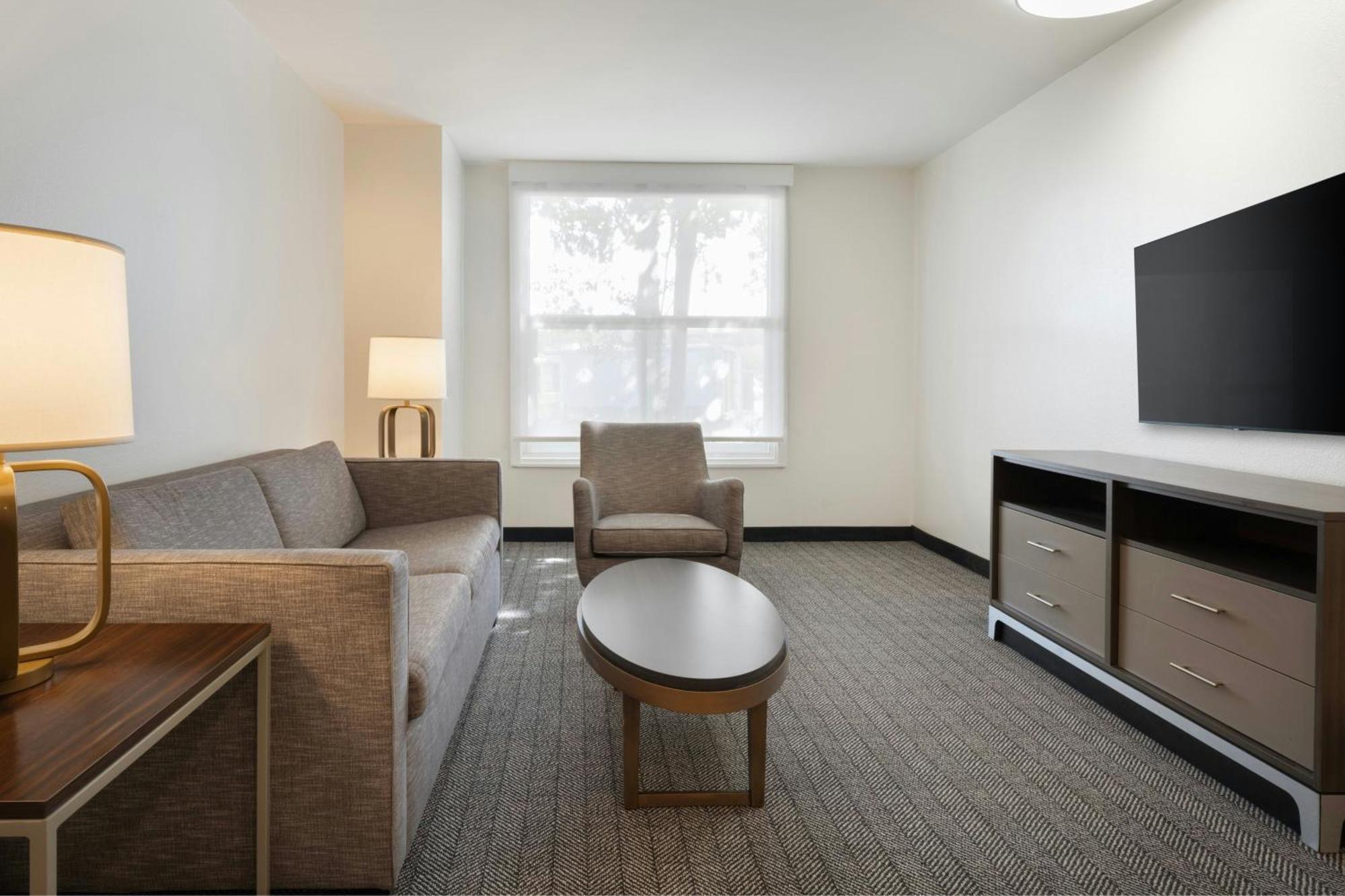 One-Bedroom King Suite Sofa Bed Roll Shower Mobility Hearing Accessible